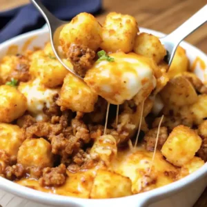 Close-up of cheesy tater tot casserole with ground beef
