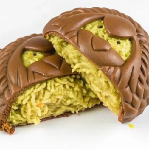 A close-up of the finished Labubu Dubai Chocolate bar with a crunchy pistachio filling.