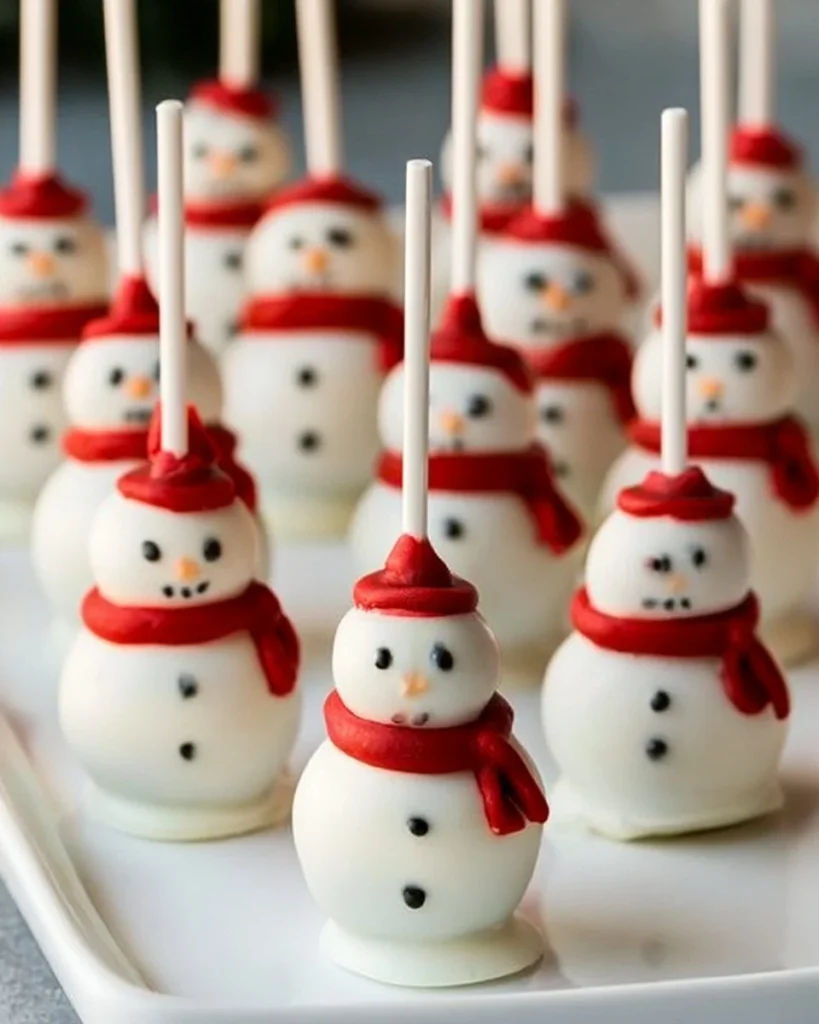 Delicious snowman cake pops decorated for winter festivities
